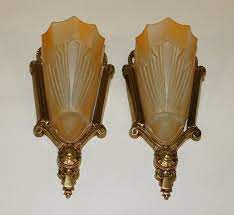 Pair of art deco style (modern) wall sconces with 3 geometric shaped frosted glass panels set in a silver painted metal frame. Pair Of Art Deco American Wall Sconces Circa 1925 With Original Slip Shades For Sale At 1stdibs