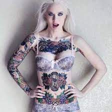 It's usually slithering along the stomach and some actually get the tattoo around the midsection. Female Stomach Tattoo Imgur