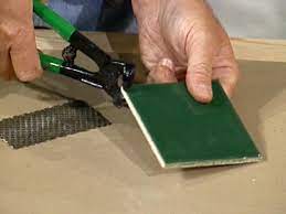 These cutters are very inexpensive, and will get the job done. How To Use Tile Cutting Tools How Tos Diy