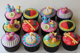 6 prepared cupcakes (white liners) ½ cup wilton's black chocolate discs; Pin On Alice In Wonderland Party Ideas