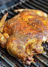 My grilled spatchcock chicken first gets a dry rub and then smoked on the grill for added flavor. The Easiest Grilled Spatchcock Chicken Kevin Is Cooking