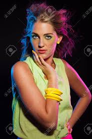 Check spelling or type a new query. Sexy Retro 80s Fashion Disco Girl With Long Blonde Hair And Green Shirt Black Background Stock Photo Picture And Royalty Free Image Image 20887254