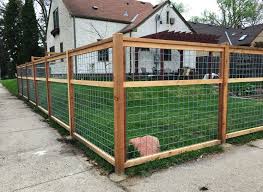 Building Quality Hog Panel Wood Fences In The Twin Cities Wood Fence Hog Panel Fencing Building A Fence
