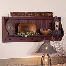 primitive wall shelf with shaker pegs