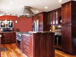 A tall wooden pantry makes a great addition to a finished kitchen. J K Cabinetry Jcw Countertops Woburn Ma