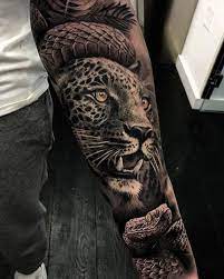 Pin De Maarten De Em Tatuajes Eduar2 Variados Tatuagens De Leopardo Tatuagem Selva Tatuagem Animal O antebraco representaria a forca e a habilidade. pinterest