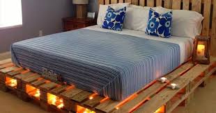 why buy a bed when you can use pallets to make one here are 14 fantastic ideas diy pallet bed bed made from pallets pallet bed with lights