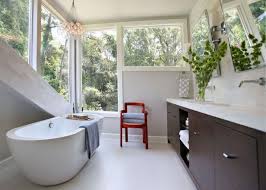 Keep it simple by using a modest color palette with just a pop of color from the red chair, this bathroom demonstrates simple elegance in a small area. Small Bathroom Ideas On A Budget Hgtv