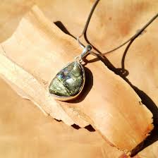 Labradorite is known as the 'bringer of light', and is a highly mystical and protective stone. Natural Raw Labradorite 925 Silver Pendant With Chain