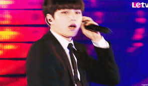 Idols Taking Off Their Ear Pieces A Normal But Charismatic Act On Stage Kbizoom