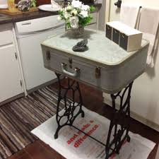 Diy Repurposed Furniture Quirky And Functional Suitcase Table With A Recycled Old Singer Sewing Ma Sewing Table Repurpose Suitcase Decor Singer Sewing Tables