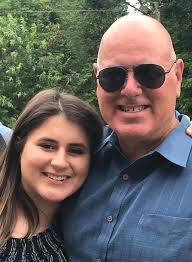 Joanne Alcorn, Chairman, presenting Kat Watkins her scholarship she is  receiving from the Florida Heartland 99s.