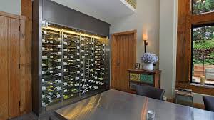 Inside this beautiful wine room an impressive 1,000+ bottles of wine are stored utilizing a combination of wine racking including: As Homeowners Focus On Wine Storage Rooms Replace Cellars Mansion Global