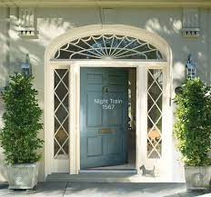 Bold yellow front door with blue gray siding. Front Door Color Ideas And Inspiration Benjamin Moore