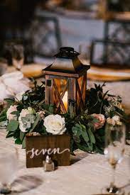 34 Chic Wedding Decoration Ideas With Lanterns On A Budget Winter Wedding Centerpieces Lantern Centerpiece Wedding Vintage Wedding Centerpieces