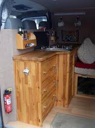I Like How There Is A Counter Backboard That Comes Up Behind The Seat To Which Shelves Can Be Attached Camper Interior Van Interior Campervan Interior
