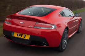 Image result for Magma Red 2011 Aston Martin