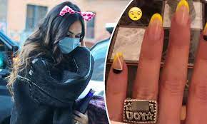 Megan fox has just two words for people who think she's engaged to machine gun kelly. Megan Fox Seemingly Shuts Down Machine Gun Kelly Engagement Rumors By Modeling A Very Vulgar Ring Daily Mail Online