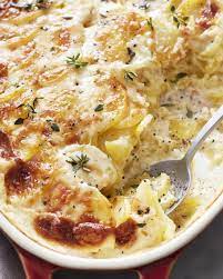 Dauphinoise Potatoes Are The Cheesy French Side Dish You Need To Know About Recipe Side Dishes For Ham Dauphinoise Potatoes Recipe French Side Dishes