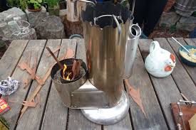 The elbow a fire proof l shaped pipe with a 90deg bend in the middle. The Fundamentals Of Rocket Stoves Permaculture Principles