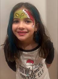 Who's the better grinch? #chicagofancyfaces #facepaintchicago  #facepaintbydunata #chicagofacepainting