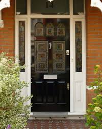 This black door is very similar to the one mentioned above, except it provides a more direct focal point to the entrance. Black Edwardian Door London Door Company
