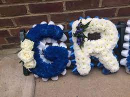 You may want to consider Blue White White Based Grandad The Village Florist