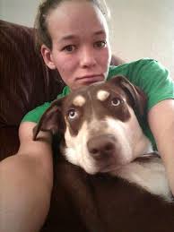 Karma, a black lab, found