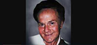 John Reese Kuhn I (September 27, 1964