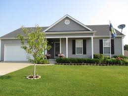 I know for sure i want black shutters for the windows on the sides of the house, but i don't know what to do with the porch! Brick Ranch House With Black Shutters Novocom Top