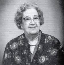 Seated in the front surrounded by her children is Esther Crook Fore 1882  -1958 born in Gilmer County . Daughter of John Crook and Varina Caroline  Spivey Crook . Wife of Jesse