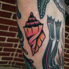 Unique Fillers For Your Most Awkward Little Empty Spaces Traditional Tattoo Gap Fillers Filler Tattoo Ideas Traditional Shell Tattoo