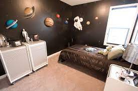 Bring layered texture to the floor with two stacked fuzzy rugs. Decorating With A Space Theme