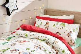 The navy blue walls add style to the bedroom. 18 Best Kids Bedding Sets Unicorns To Robots And Geometric Prints London Evening Standard Evening Standard