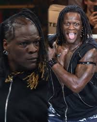 R-Truth's son Christopher Killings in-response to Triple H implying that  R-Truth's situation is all part of the show: “Stop the 🧢”