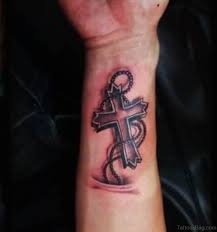Where wooden cross is the most favorite one tattoo design. 70 Great Cross Tattoos For Arm
