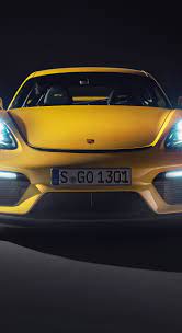 1440x2630 Porsche 718 Cayman Gt4 Glow Headlights Yellow Car Wallpaper Porsche 718 Cayman Porsche Car Wallpapers