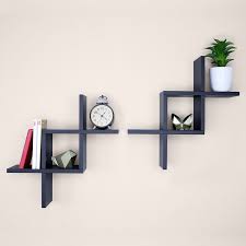 Express your distinctive personal style by using this wall shelf to display a curated collection of meaningful books, photos, and objects. Ballucci Criss Cross Floating Wall Shelf Set Of 2 Black Amazon In Furniture