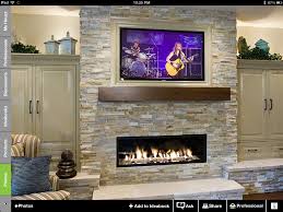 Shop our beautiful collection of marble fireplace mantel surrounds ideas. Framed Tv Rustic Mantel Over Linear Fireplace Fireplace Home Fireplace Basement Fireplace Und Stone Fireplace Designs