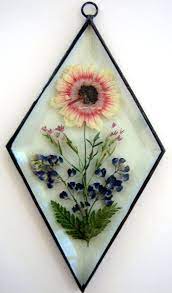 Maybe you would like to learn more about one of these? Stained Glass Pressed Flower Bevel Suncatcher Pressed Flower Crafts Pressed Flowers Pressed Flower Art