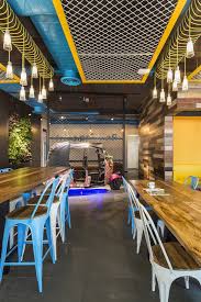 A Tour Of Booking Com S Cool Mumbai Office Office Cafeteria Design Cafeteria Design Restaurant Design Rustic