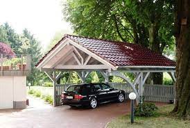 Das Spitzdach Lasst Ihren Neuen Carport Wie Ein Separates Gebaude Erscheinen Carport Designs Pergola Pole Barn House Plans