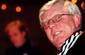 Image of Cameroon team coach Winnie Schaefer wears a black arm band