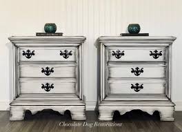 A good dresser or chest of drawers not only keeps your clothes organized and protected from dust, but it also makes for an elegant accent that ties the room together. Beautiful Set Of 2 Drawer Nightstands Finished In White With Black Accents Throughout And Painted Furniture Colors Redo Furniture White Chalk Paint Furniture