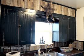 A tutorial on how to make a wine cork backsplash and chalkboard for your kitchen. Black Chalkboard Cabinets With Pallet Board Backsplash 1001 Pallets