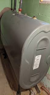 The tank, empty, floated up out of the ground when the stream flooded. Oil Tank Removal Pro Professional Oil Tank Service Provider Call Us 978 481 8131