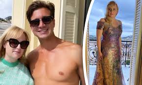 Ever since rebel wilson stepped onto the screen in pitch perfect, we were in love. Rebel Wilson S Boyfriend Jacob Busch Loves How Fire She Looks In This Plunging Green Swimsuit The Best News Exchange Magazine As Of Today
