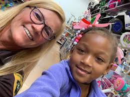 Captain Mary Potter and her lil sister spent time yesterday over lunch and  the purchase of a brand new bicycle. Thank you Captain Potter for your  commitment to our local youth. #bbbsofstjosephcounty