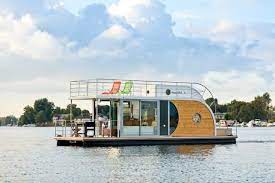 Believe It Or Not But You Can Drive Your Private Houseboat To Every Direction Around The Great City Of Berlin Go North To Mu House Boat Floating House Berlin