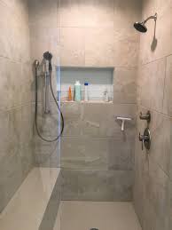 How Do You Feel About Solid Surface Corian Shower Walls Vs Tile This Is Corian Base And Bench W Tile In 2020 Corian Shower Walls Shower Wall Kits Master Shower Tile